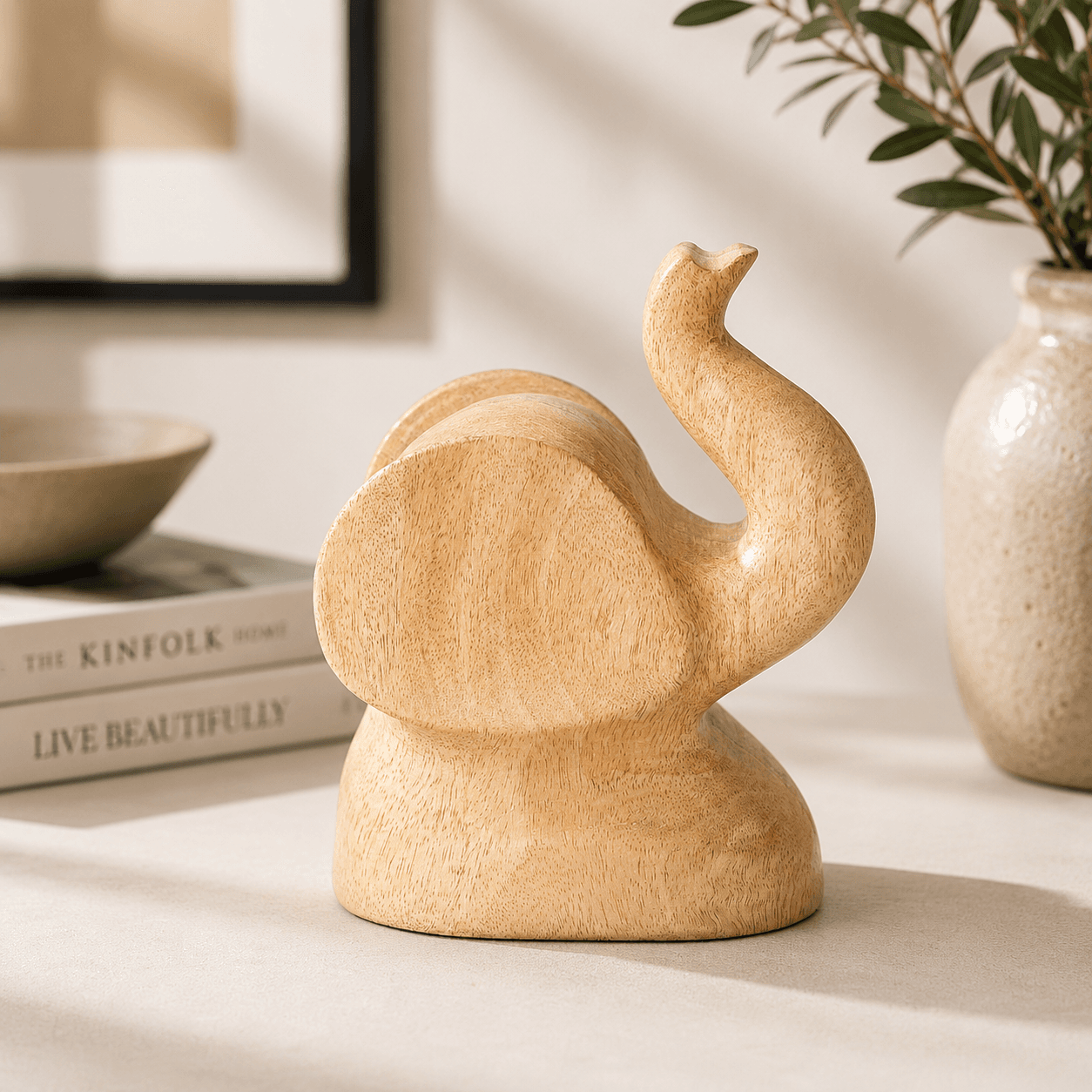 Handcrafted wooden elephant sculpture